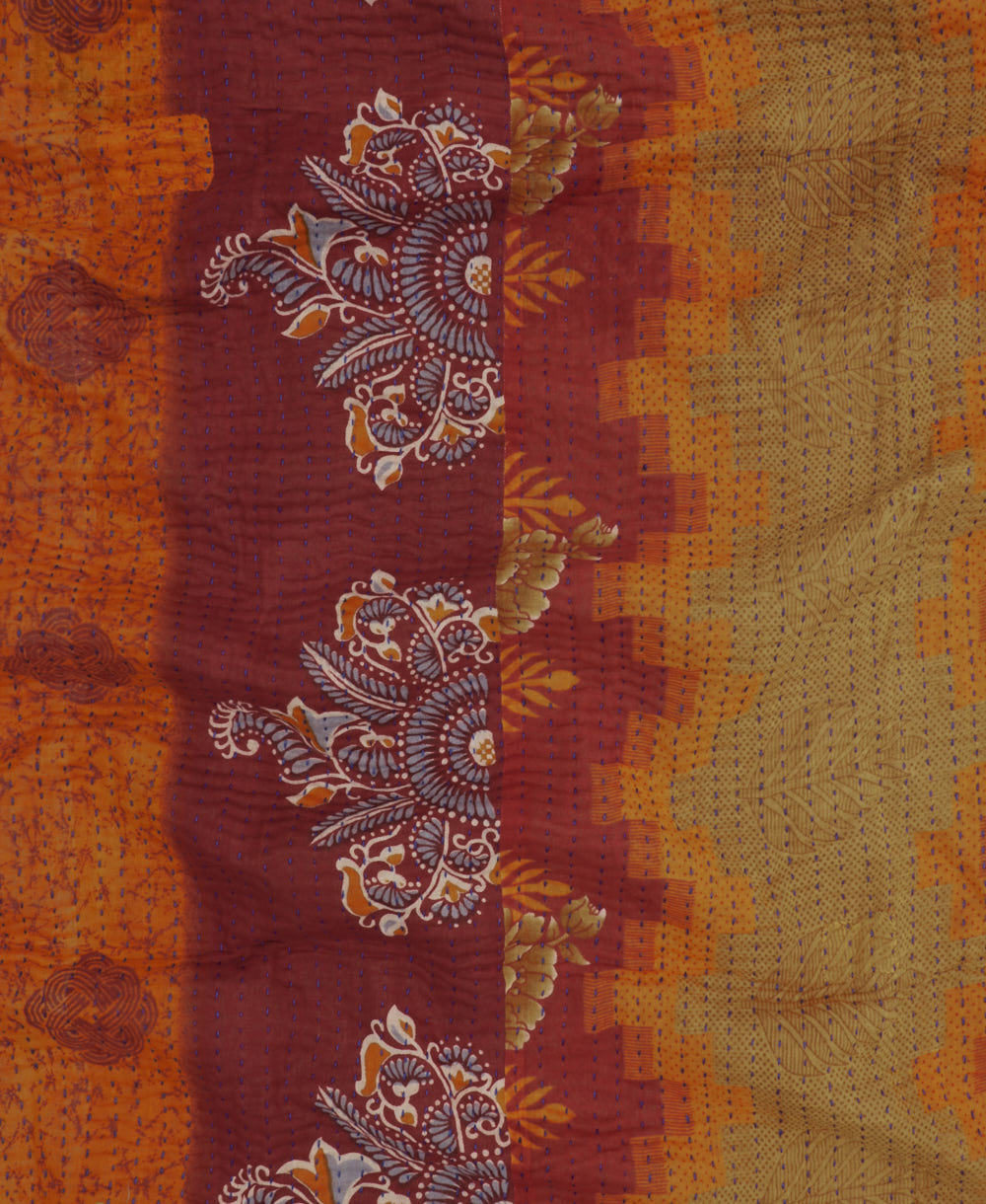 Kantha quilt throw featuring sunset orange traditional kantha hand stitching