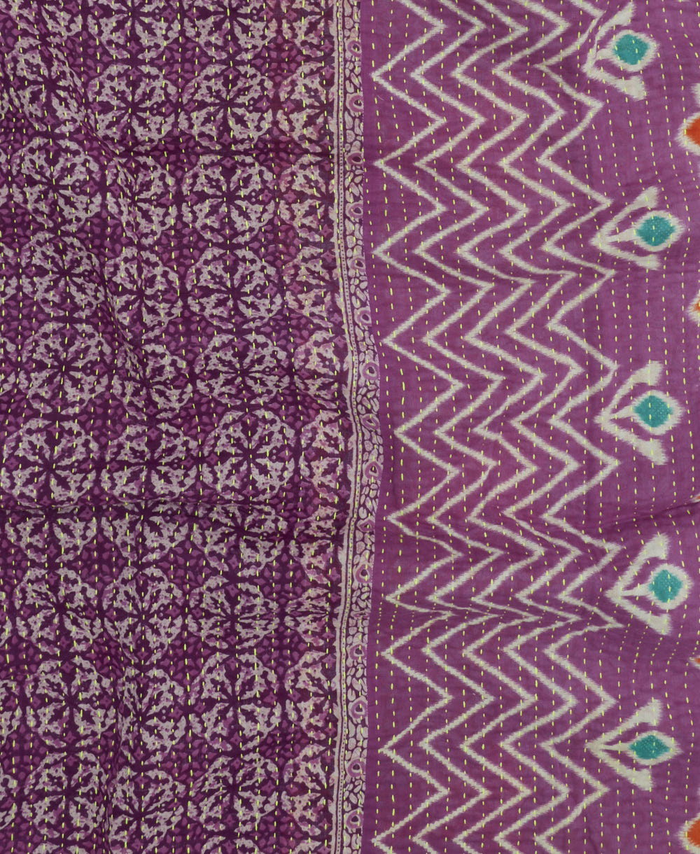 Kantha quilt throw featuring white traditional kantha hand stitching in an orchid purple & white medallion