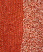 Kantha quilt throw featuring white traditional kantha hand stitching in a persimmon orange & white floral