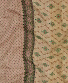 Kantha quilt throw featuring black traditional kantha hand stitching in an emerald green diamond print