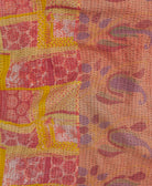 Kantha quilt throw featuring pastel pink geometric traditional kantha hand stitching