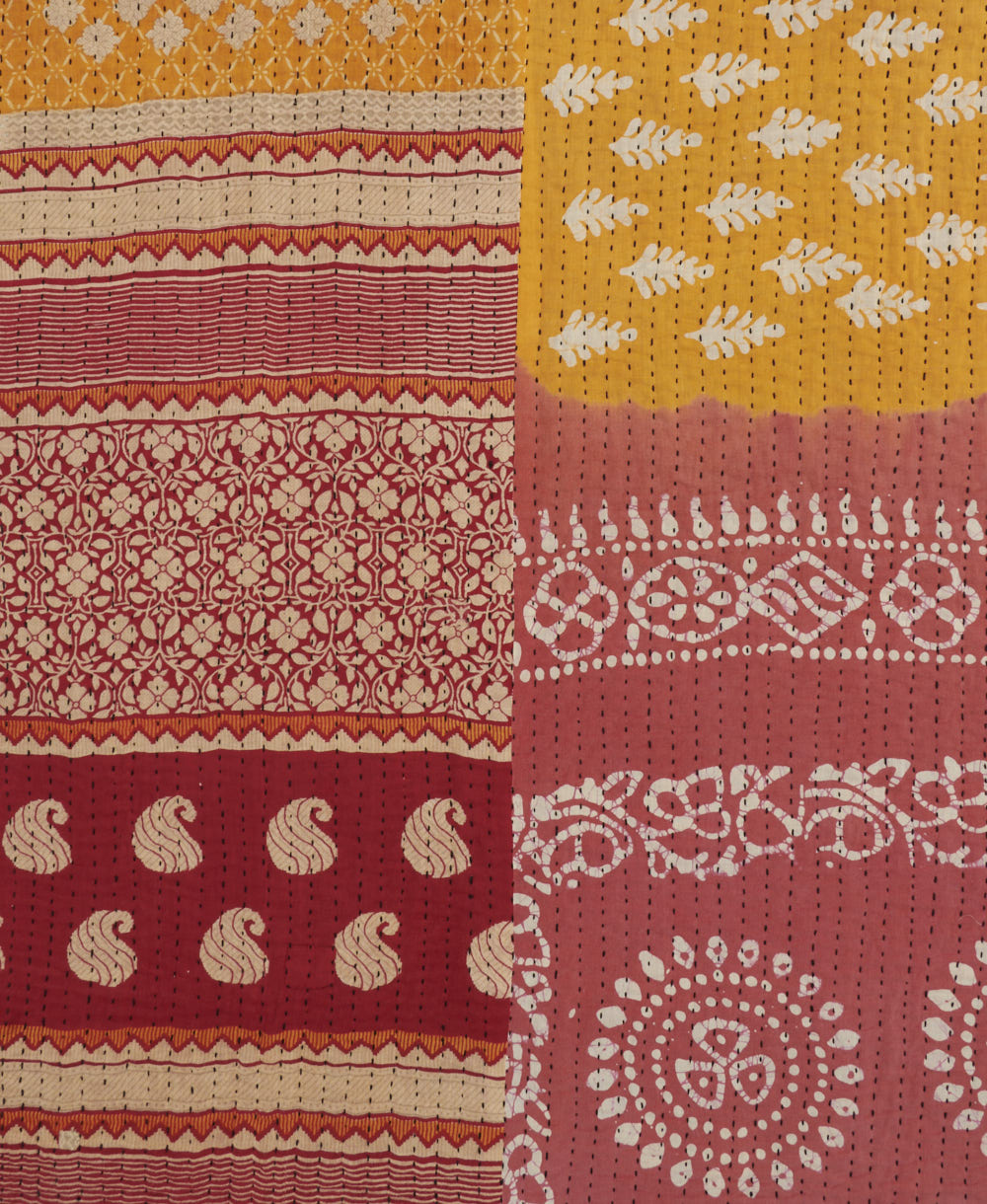 yellow-orange floral Kantha quilt throw made of recycled vintage saris