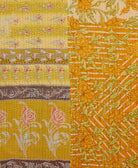 Kantha quilt throw featuring traditional kantha hand stitching