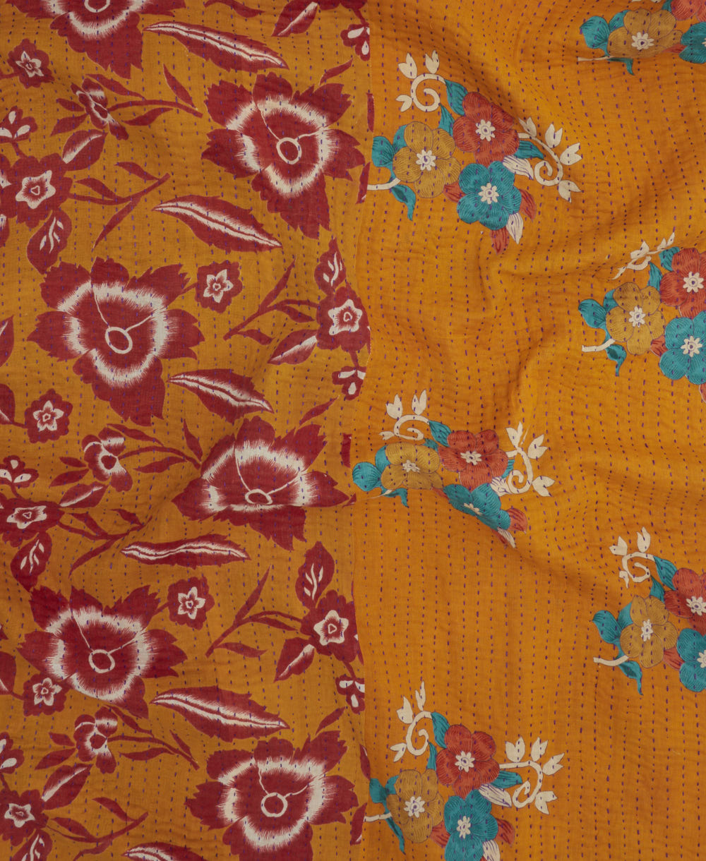 Kantha quilt throw featuring traditional kantha hand stitching