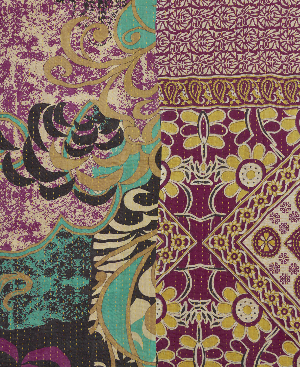 Kantha quilt throw featuring traditional kantha hand stitching