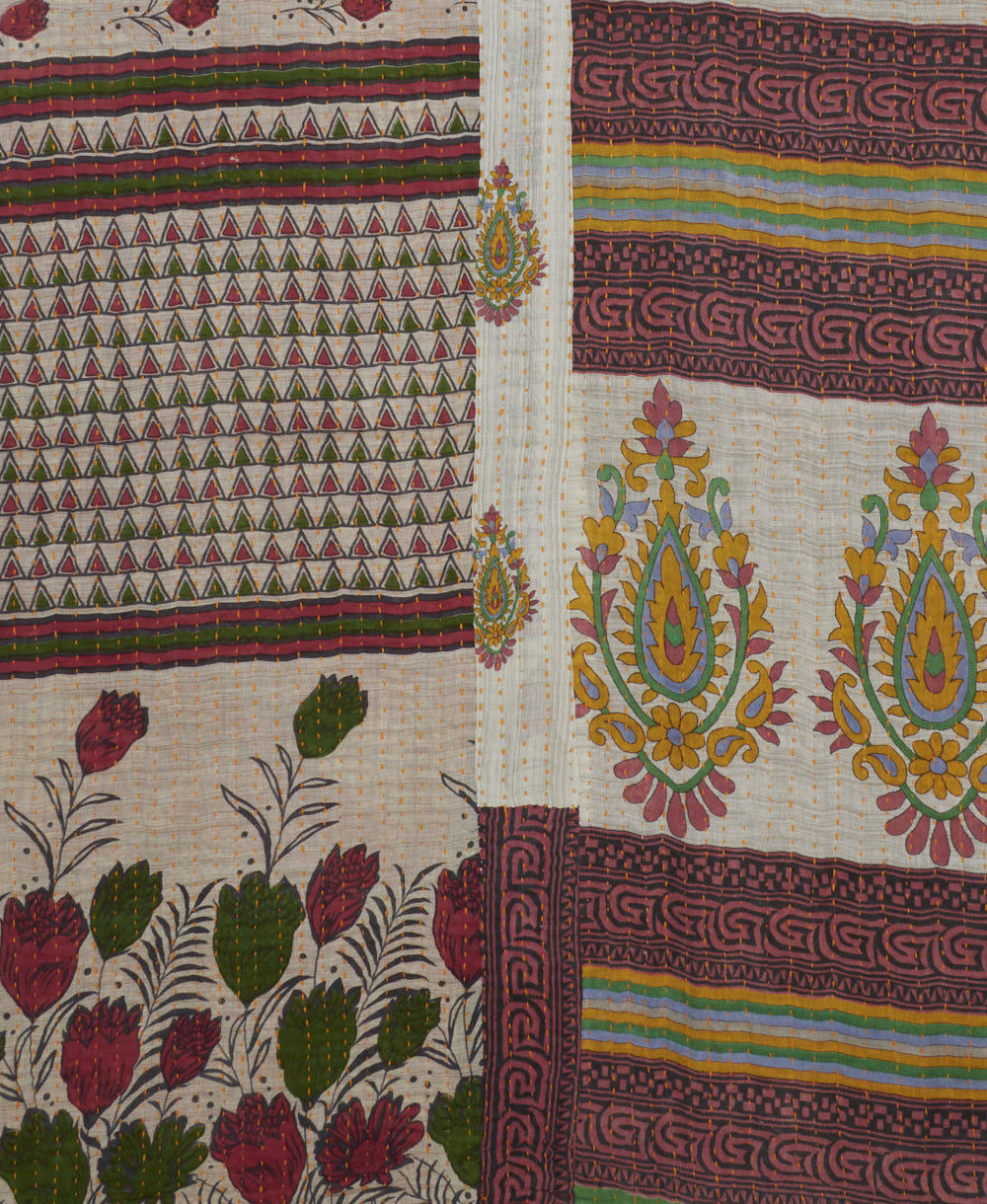 Kantha quilt throw featuring traditional kantha hand stitching