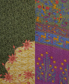 Kantha quilt throw featuring traditional kantha hand stitching