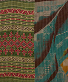 Kantha quilt throw featuring traditional kantha hand stitching