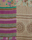 Kantha quilt throw featuring traditional kantha hand stitching