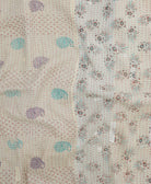 Kantha quilt throw featuring traditional kantha hand stitching