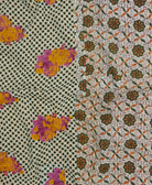 Kantha quilt throw featuring traditional kantha hand stitching