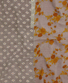 Kantha quilt throw featuring traditional kantha hand stitching