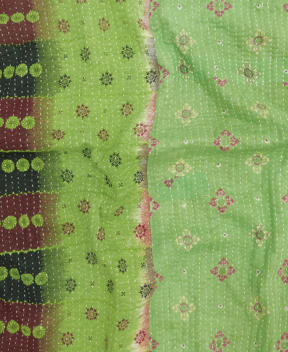 Kantha quilt throw featuring traditional kantha hand stitching