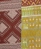 Kantha quilt throw featuring traditional kantha hand stitching