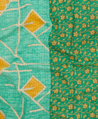 Kantha quilt throw featuring traditional kantha hand stitching