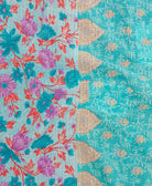 Kantha quilt throw featuring traditional kantha hand stitching