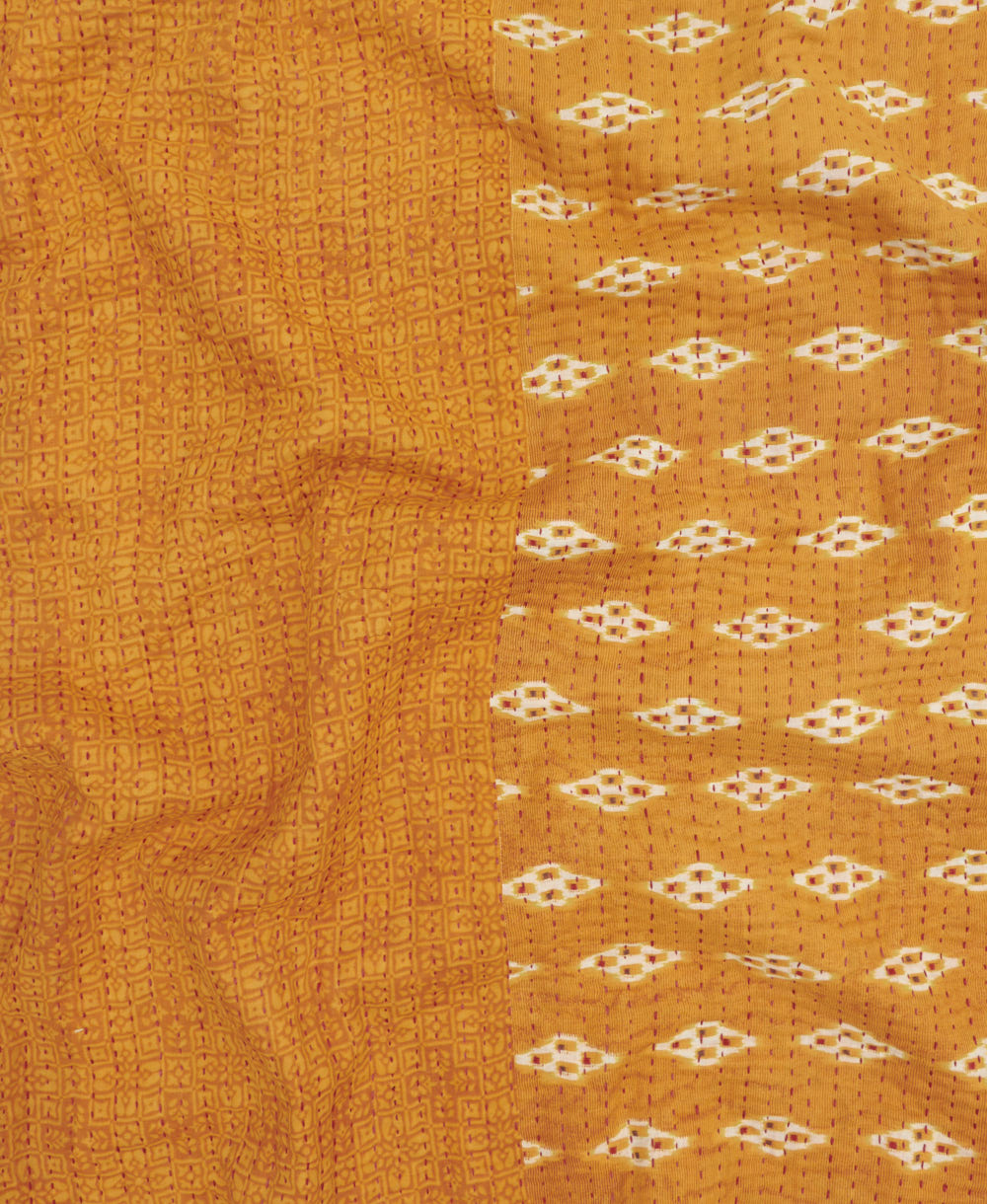 Kantha quilt throw featuring traditional kantha hand stitching