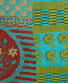 Kantha quilt throw featuring traditional kantha hand stitching