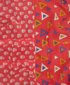 Kantha quilt throw featuring traditional kantha hand stitching