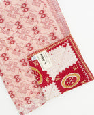 Kantha quilt throw featuring traditional kantha hand stitching