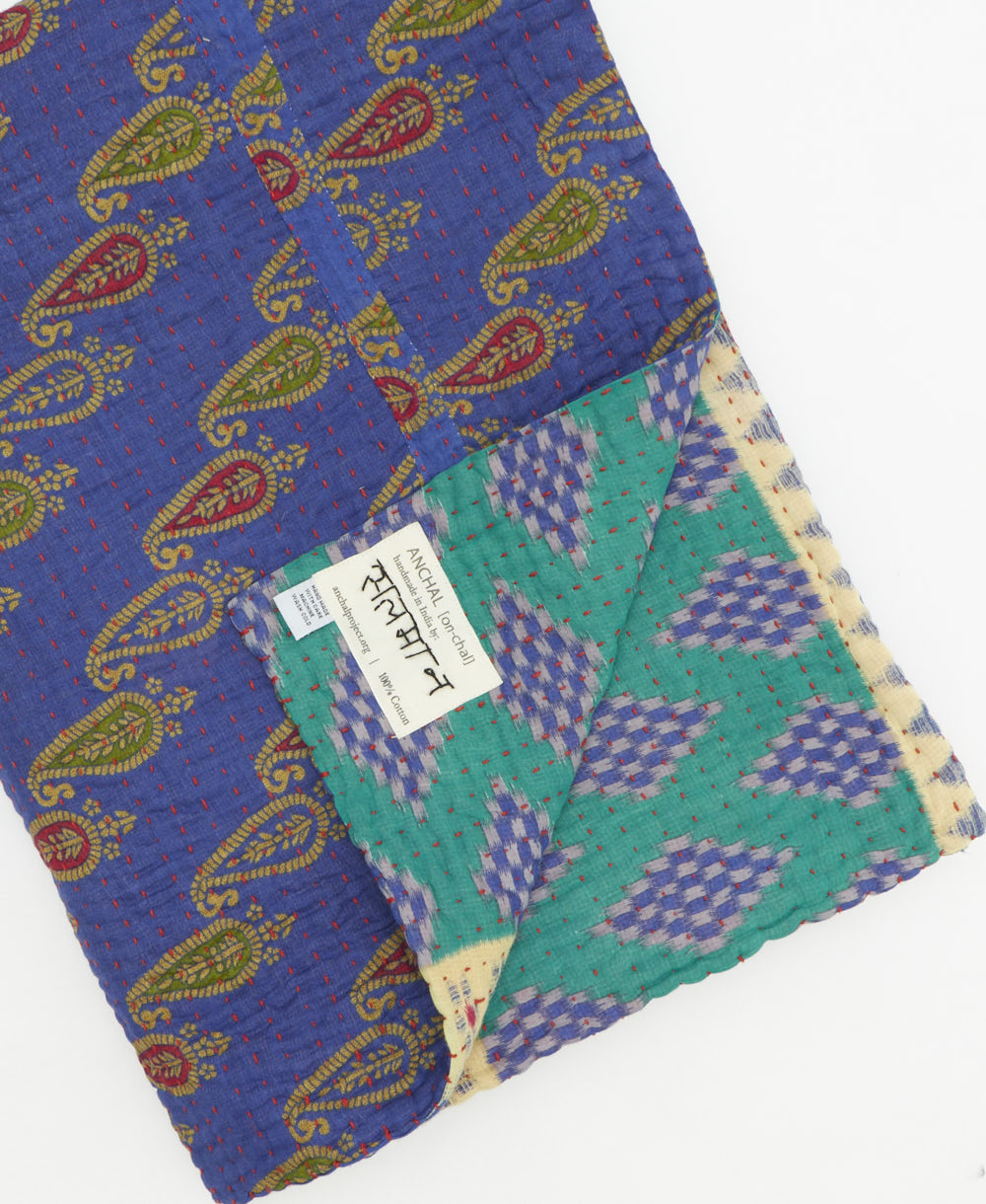 Kantha quilt throw featuring traditional kantha hand stitching