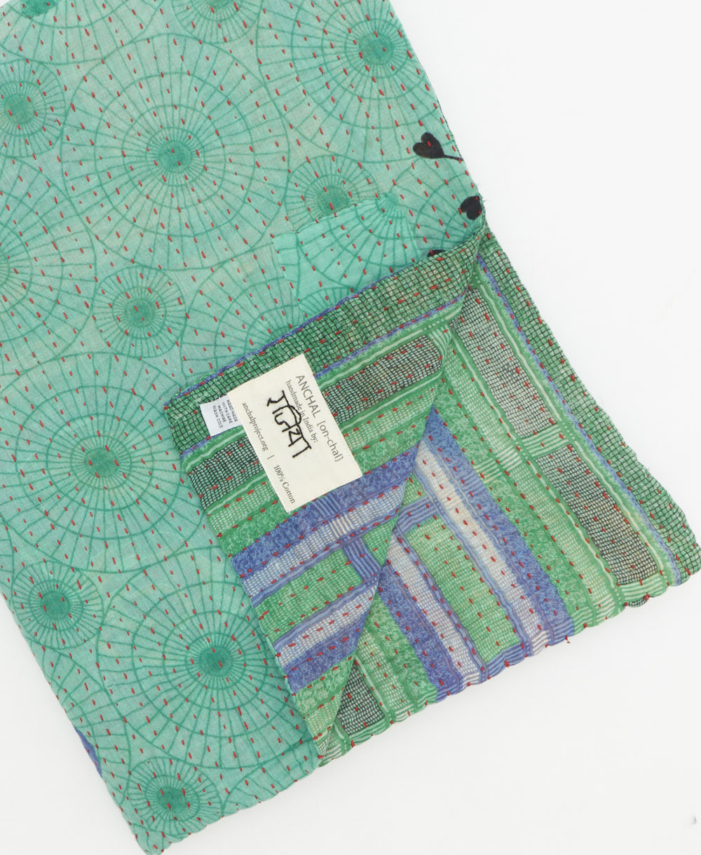 Kantha quilt throw featuring traditional kantha hand stitching