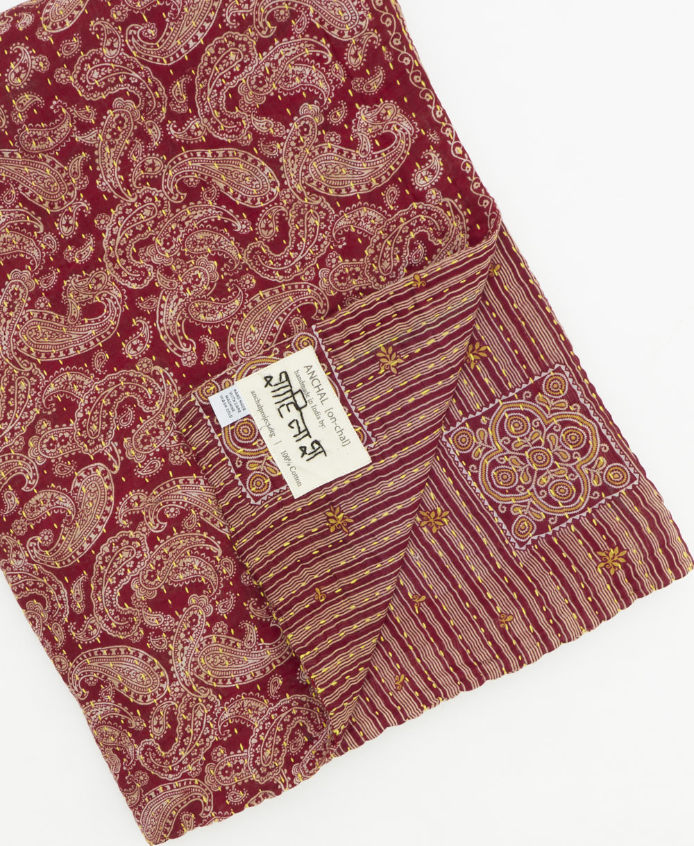 Kantha quilt throw featuring traditional kantha hand stitching