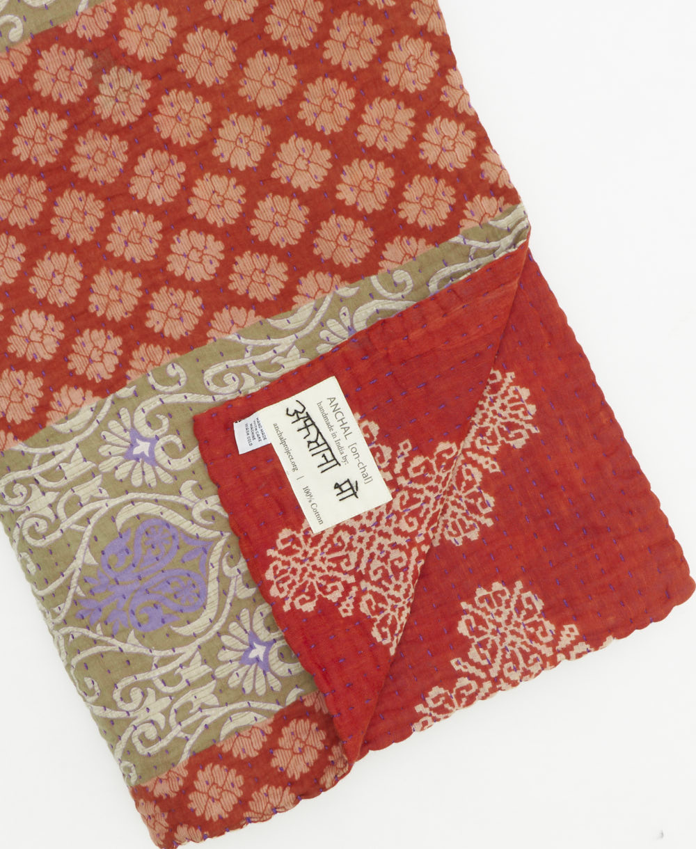 Kantha quilt throw featuring traditional kantha hand stitching