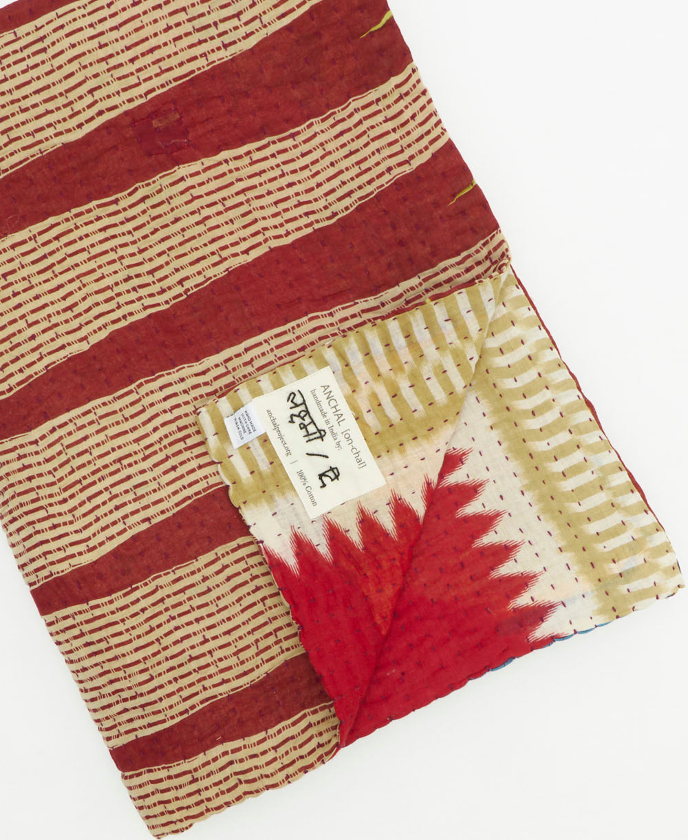 Kantha quilt throw featuring traditional kantha hand stitching