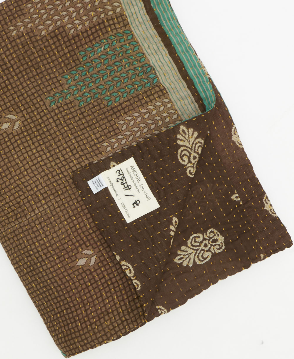 Kantha quilt throw featuring traditional kantha hand stitching