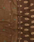 kantha quilt throw with a tag featuring the hand-stitched signature of the maker