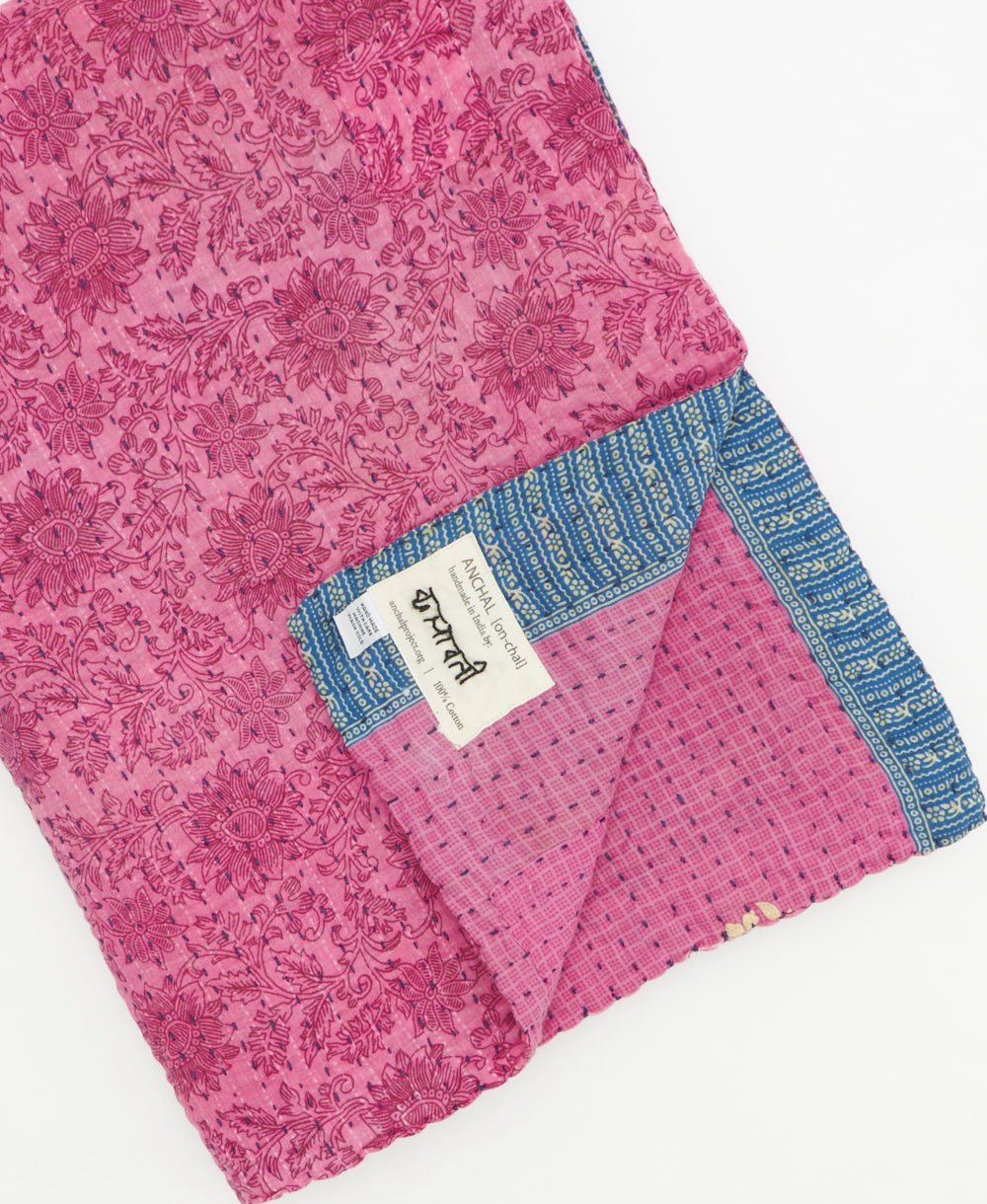Kantha quilt throw featuring traditional kantha hand stitching