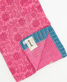 Kantha quilt throw featuring traditional kantha hand stitching