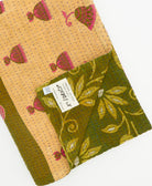 Kantha quilt throw featuring traditional kantha hand stitching