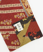 Kantha quilt throw featuring traditional kantha hand stitching