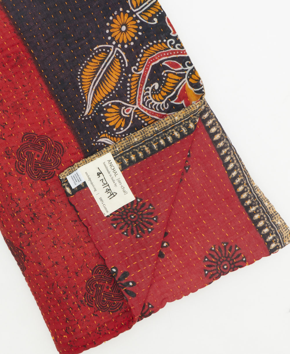 Kantha quilt throw featuring traditional kantha hand stitching