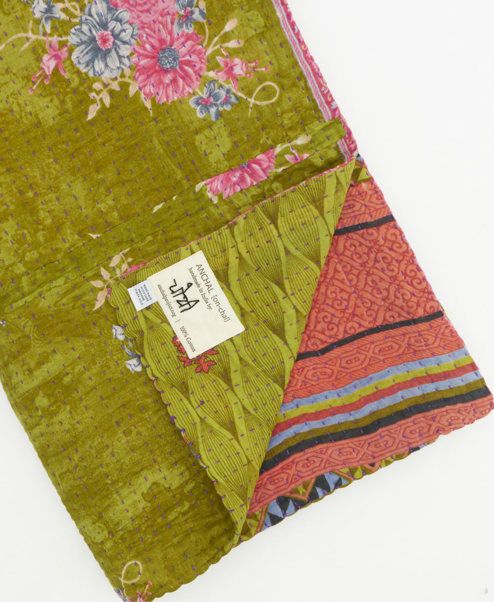 Kantha quilt throw featuring traditional kantha hand stitching