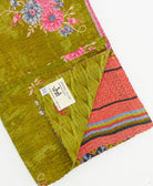 Kantha quilt throw featuring traditional kantha hand stitching