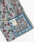 Kantha quilt throw featuring traditional kantha hand stitching