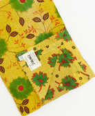 Kantha quilt throw featuring traditional kantha hand stitching