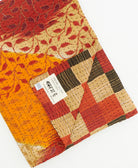 Kantha quilt throw featuring traditional kantha hand stitching