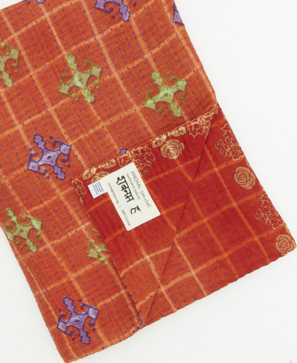 Kantha quilt throw featuring traditional kantha hand stitching