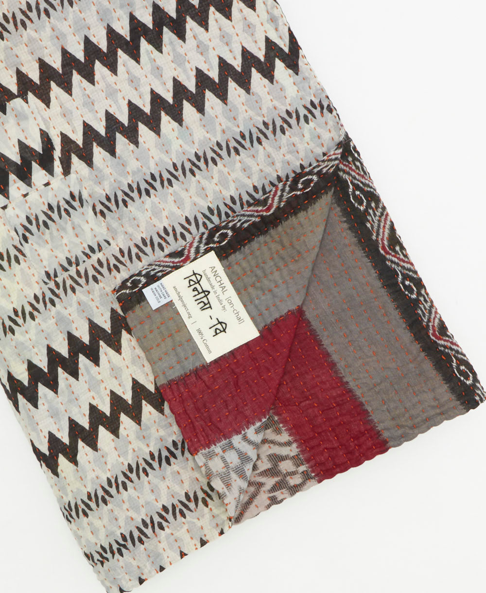 Kantha quilt throw featuring traditional kantha hand stitching