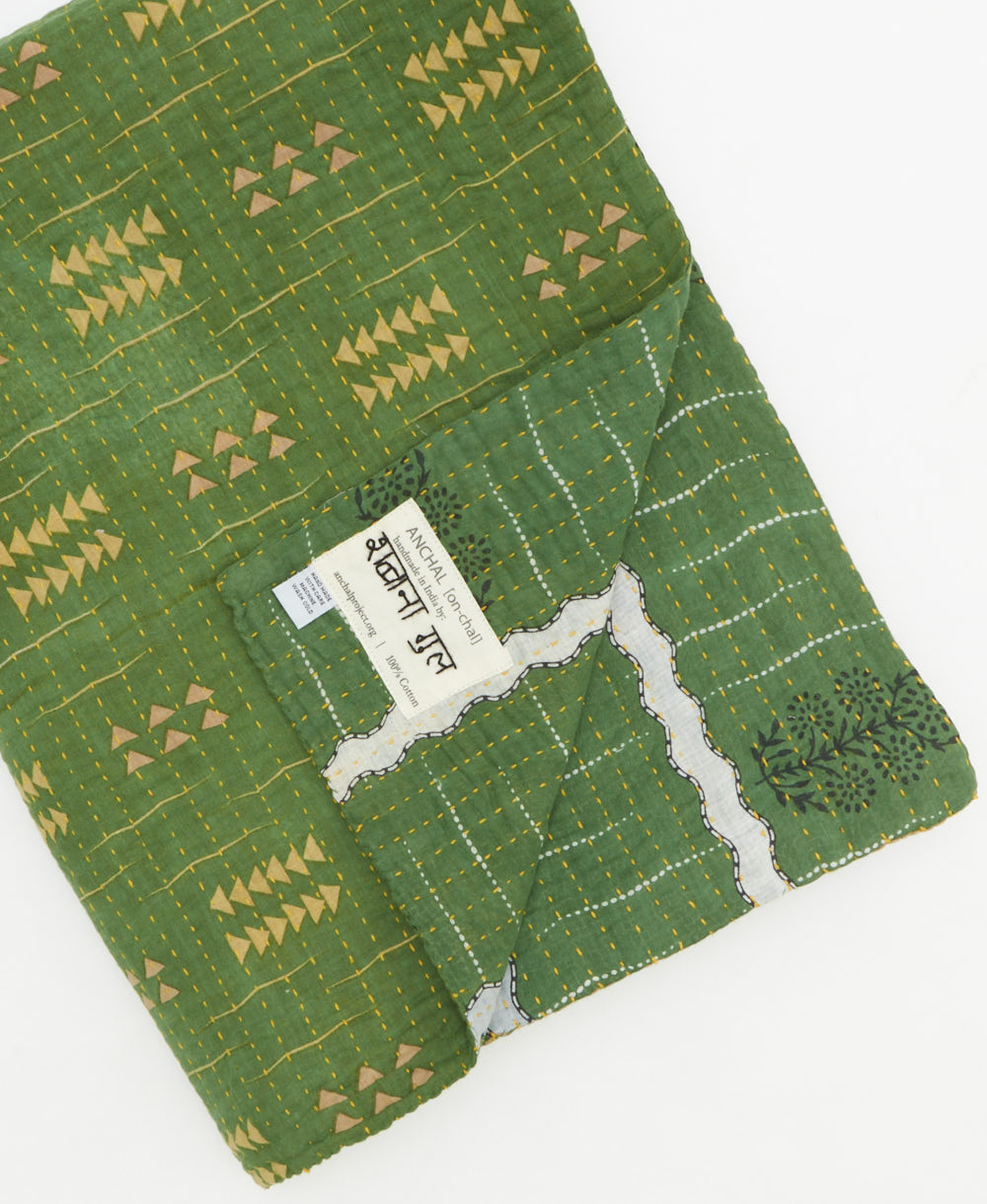 Kantha quilt throw featuring traditional kantha hand stitching