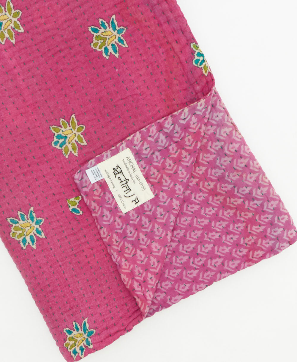 Kantha quilt throw featuring traditional kantha hand stitching