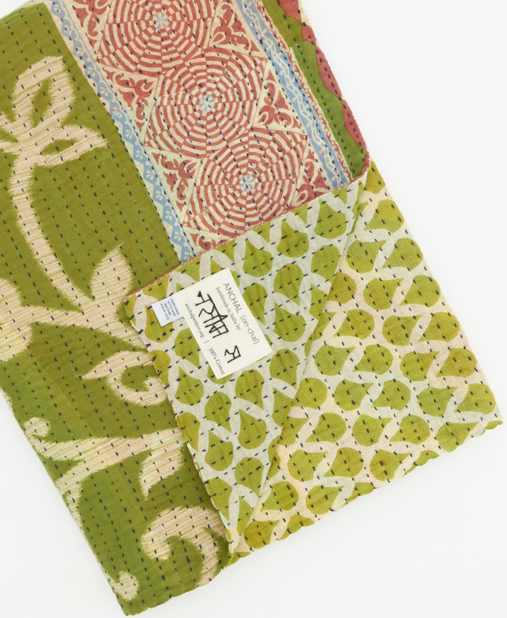 Kantha quilt throw featuring traditional kantha hand stitching