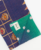 Kantha quilt throw featuring traditional kantha hand stitching