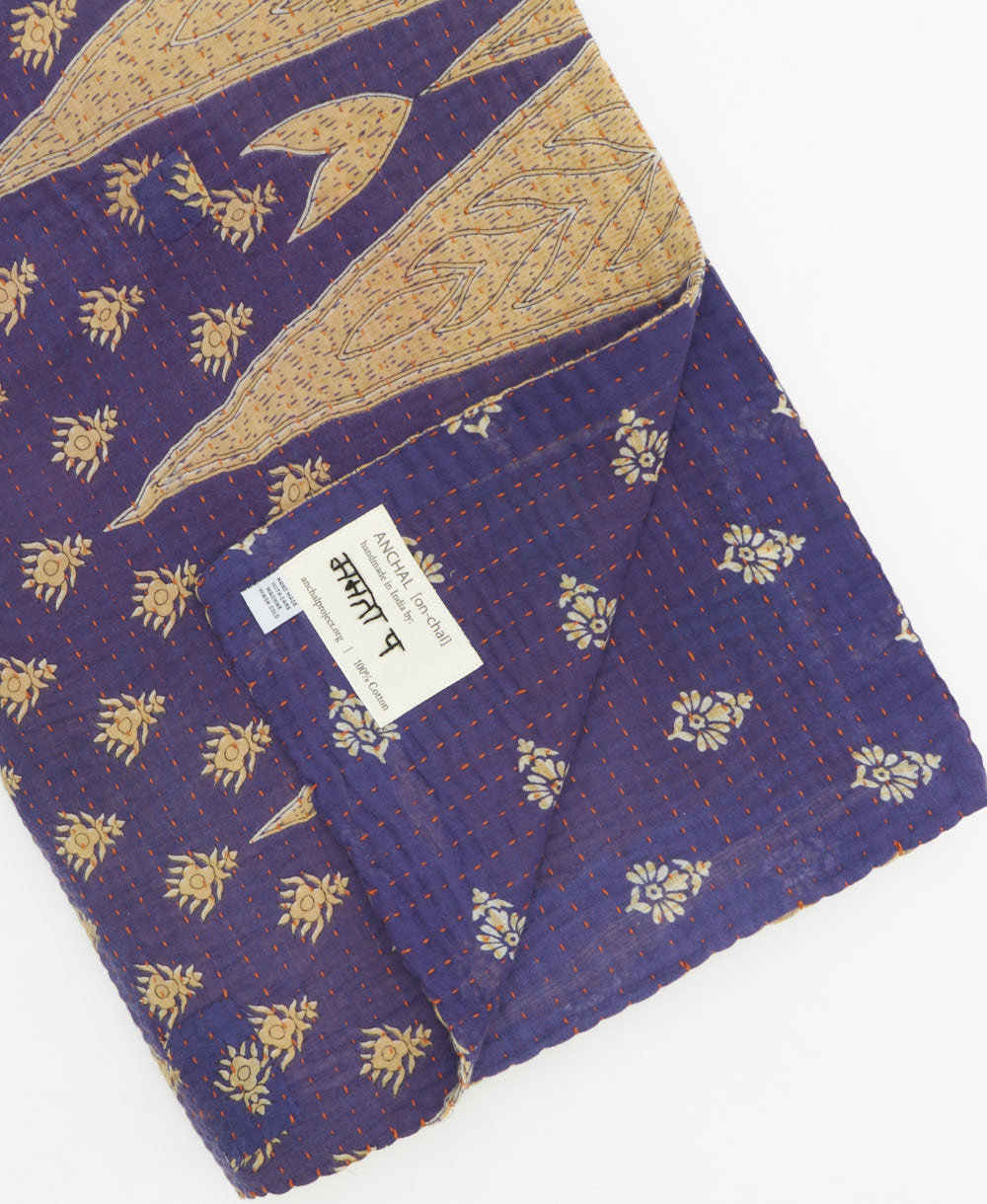 Kantha quilt throw featuring traditional kantha hand stitching
