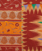 kantha quilt throw with a tag featuring the hand-stitched signature of the maker