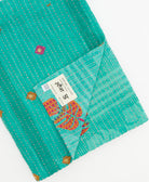 Kantha quilt throw featuring traditional kantha hand stitching